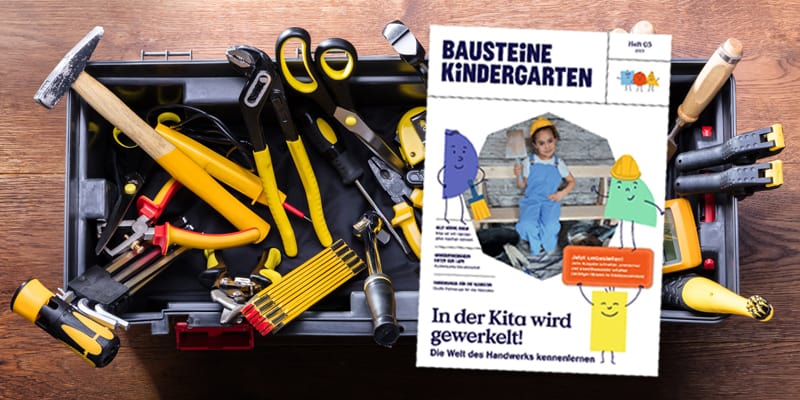 Werkzeugkiste und Ausgabe 3/23 von Bausteine Kindergarten